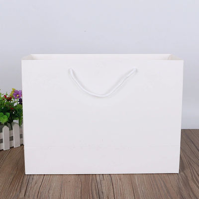 白いクラフト紙の100gsm衣類のショッピング トート バックの注文のロゴ