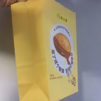 使い捨て可能なBBQのグリースを弾くペーパー サンドイッチは注文のロゴによって並べられるアルミ ホイル袋を袋に入れる